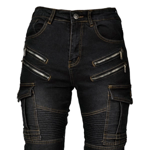 Macro shot of reinforced motorcycle jeans stitching and contrasting yellow seams detail