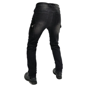Rear view of motorcycling cargo pants featuring elastic accordion panels and deep gray denim