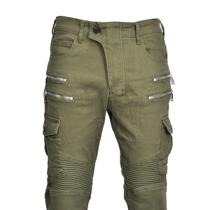 Close-up of olive green motorcycle cargo pants with zipper accents and knee pleats
