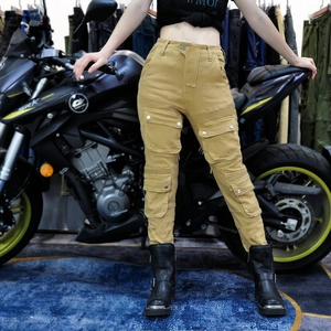 Detail of khaki motorcycle cargo pants with multi-pockets and protective knee pleats