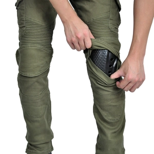 Detail of army green motorcycle cargo pants with removable knee protector and stretch panels