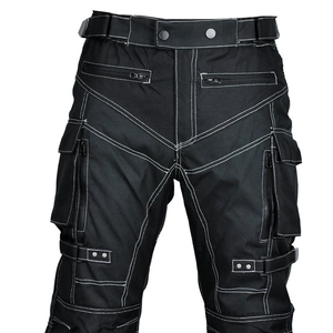 Detail of waterproof motorcycle pants featuring white contrast stitching and multi-pocket design