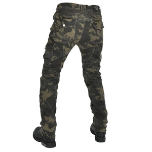 Detail view of camouflage motorcycle pants featuring elastic waist and functional cargo pockets