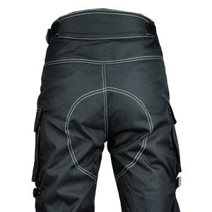 Detail of black motorcycle riding pants featuring white contrast stitching and reinforced back