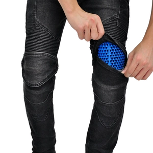 Detail of motorcycle jeans showing flexible knee pleats and removable honeycomb armor pad