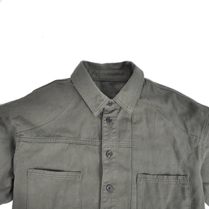Close-up of heavy-duty cotton motorcycle riding shirt with reinforced stitching