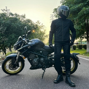 Full set of black breathable motorcycle riding gear with armored jacket and pants