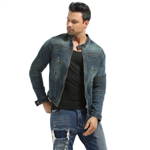 Detail of blue motorcycle denim jacket with protective pleated sleeves and slim fit design