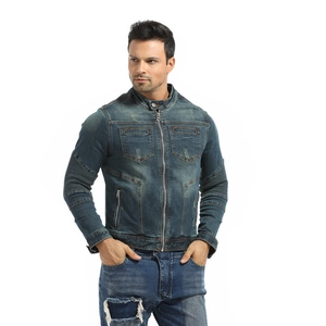 Detail of vintage blue motorcycle denim jacket showing zipper collar and ribbed elbow panels