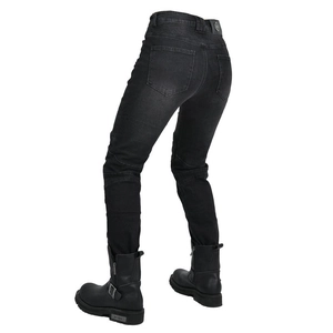 Detail of motorcycle jeans showing elastic accordion panels on knees and waist