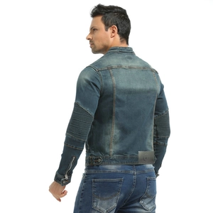 Rear view of dark blue denim motorcycle jacket with accordion sleeves and metal details
