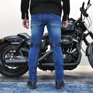 Detail of men's motorcycle jeans featuring knee protection pads and back pocket flap design