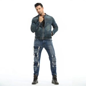 Front view of men's vintage washed denim riding suit with distressed details
