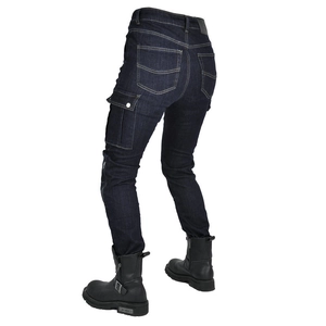 Detail view of women's biker jeans with cargo pockets paired with black leather boots