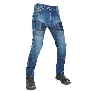 Detail of accordion stretch panels and reinforced patches on motorcycle riding jeans