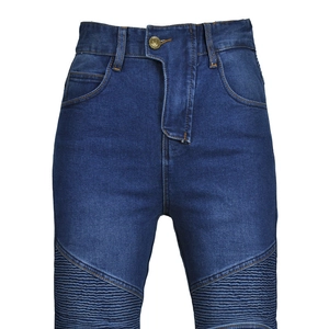 Macro detail of biker-style ribbed stitching on dark blue stretch motorcycle jeans