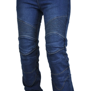 Close-up of deep blue motorcycle denim pants with reinforced accordion panels on knees