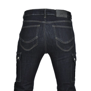 Detail view of motorcycle jeans with reinforced stitching and logo leather patch