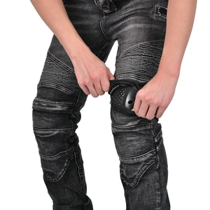 Detail of knee protector pocket with honeycomb armor on retro biker jeans