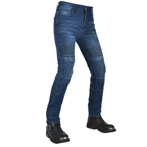 Close-up of motorcycle jeans with protective quilting and black leather riding boots