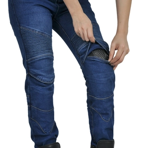 Detail of blue motorcycle jeans featuring flexible accordion panels and protective knee pads