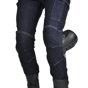 Detail of dark blue denim motorcycle pants showing the knee pocket with removable armor