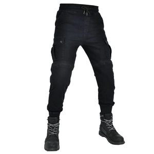 Detail of black motorcycle riding jeans with cargo pockets and ribbed cuffed ankles