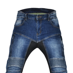 Detail view of motorcycle jeans with accordion stretch panels and reinforced stitching
