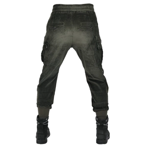 Detail view of olive green corduroy motorcycle cargo pants with large side pockets