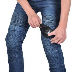 Detail of motorcycle jeans showing knee accordion panels and armor pocket insertion