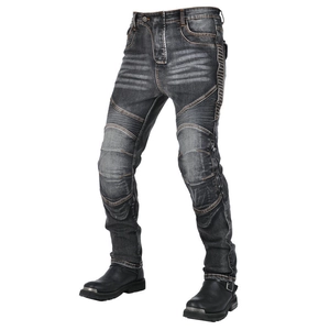 Detailed view of dark gray motorcycle jeans with accordion stretch panels on the knees