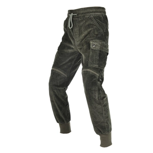 Detail of olive green corduroy cargo pants with elastic drawstring waist and side pockets