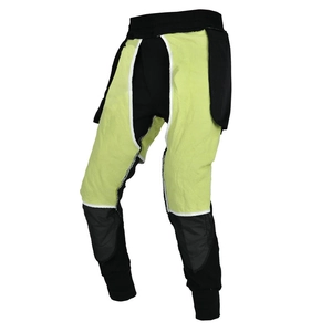 Detail of motorcycle pants with protective gear inserts and breathable mesh fabric