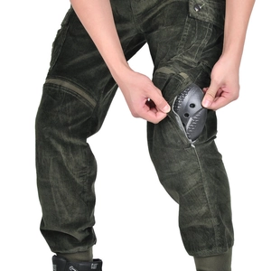 Deep green corduroy motorcycle pants featuring removable knee protectors and cargo pockets