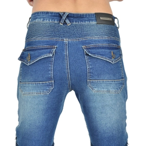 Detail of blue motorcycle denim jeans showing back waist accordion panels and leather logo patch