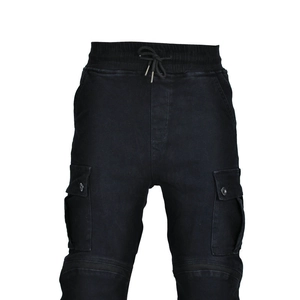 Detail view of motorcycle cargo pants featuring elastic drawstring waist and pleated knee panels