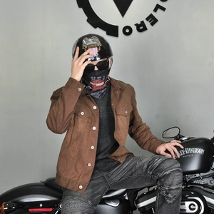 Men's retro brown waxed motorcycle jacket with vintage workwear style and protective padding