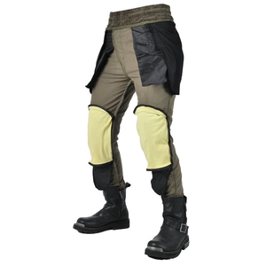 Detail of motorcycle pants showing internal protective lining and yellow knee armor padding