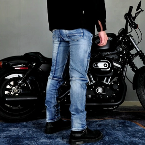 Men's vintage blue motorcycle jeans with protective Kevlar reinforcement and denim wash
