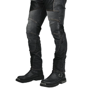 Detail view of motorcycle jeans with accordion stretch panels and reinforced knee protection