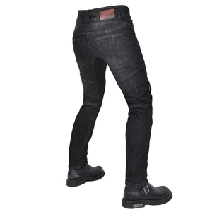 Detail view of motorcycle jeans with protective pads and stretch panels for riding comfort