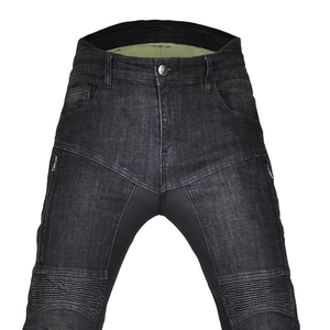 Detail of black motorcycle jeans showing accordion stretch panels on knees and reinforced seams