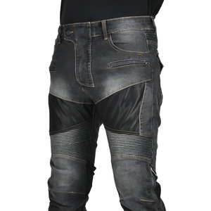 Detail of motorcycle denim jeans with elastic pleats and protective knee pads