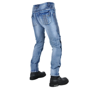 Detail of motorcycle jeans featuring flexible accordion panels and side zipper pockets