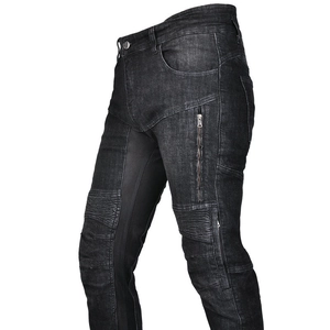 Detail view of motorcycle jeans with mesh panels and pleated knee protection pads