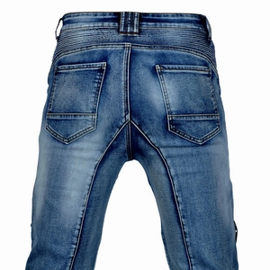 Detail of rear accordion stretch panels on blue motorcycle jeans for riders