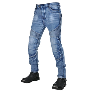 Detail of light blue motorcycle jeans with accordion stretch panels on the knees and thighs