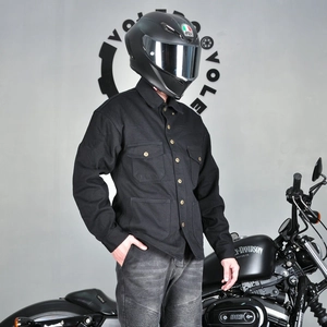 Detailed view of motorcycle riding jacket with classic collar and durable pockets