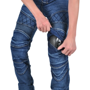 Detail view of motorcycle jeans featuring accordion stretch panels and removable knee armor
