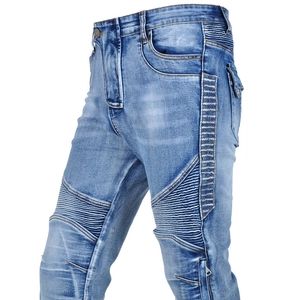 Detail view of motorcycle jeans featuring accordion stretch panels and side cargo pocket